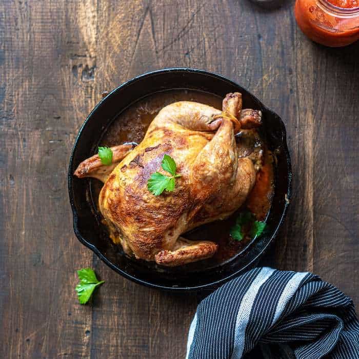 cast iron pot with chicken